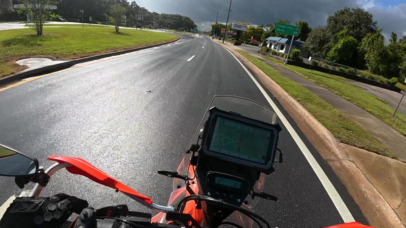 Rain-soaked road and wet asphalt